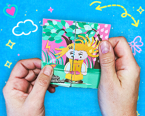 Hands holding an illustrated never-ending card featuring colorful characters and playful scenes.
